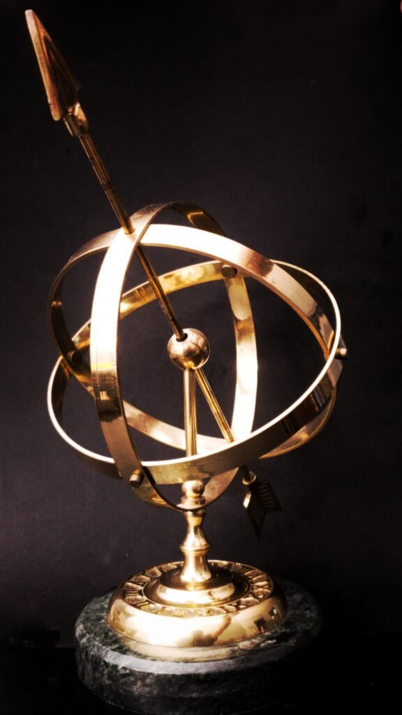 Brass-colored and Black Table Decor